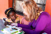 Susan Reading to Children, Soweto, South Africa